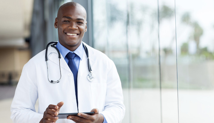 Picture of a doctor in a white lab coat.